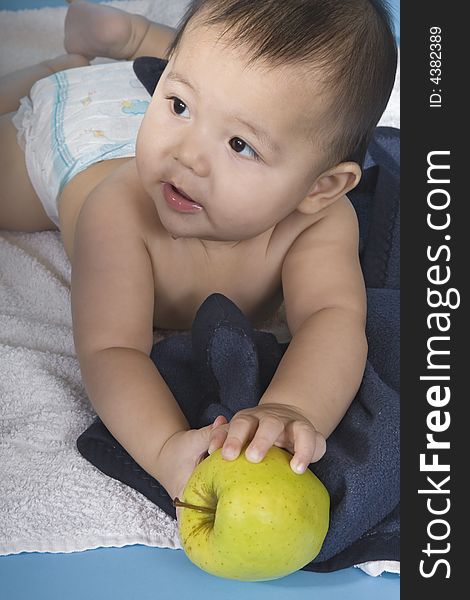 Baby with apple