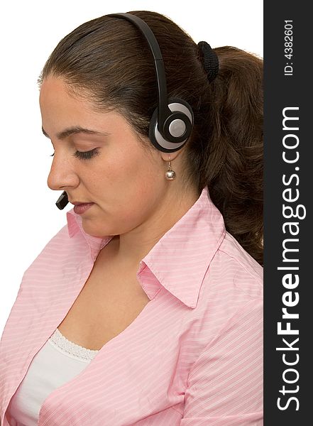 A girl, wearing headphones, very concentrated listening. A girl, wearing headphones, very concentrated listening