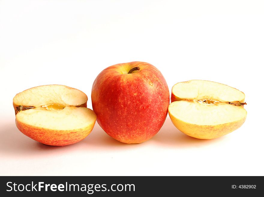 Red apple with slices on wight background