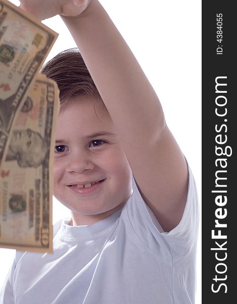 The little boy smiles and throws money. The little boy smiles and throws money