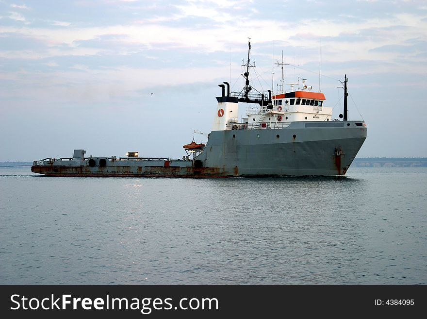 Industrial ship coming into port. Industrial ship coming into port.