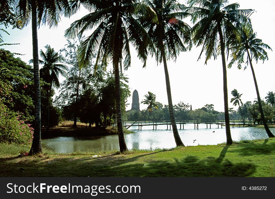 Lake-side Temple Ruin With Palm Trees