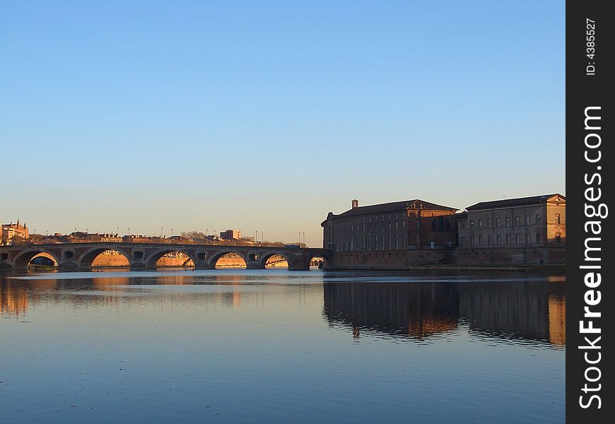 The nice bridge on the river garonne which flow cross toulouse