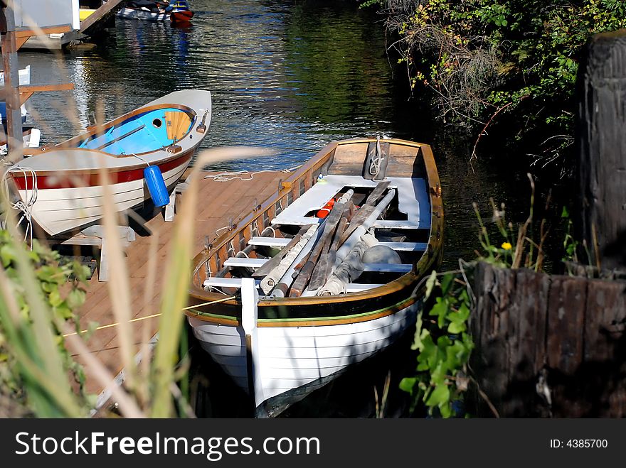 Boats in a quiet inlet at the end of summer