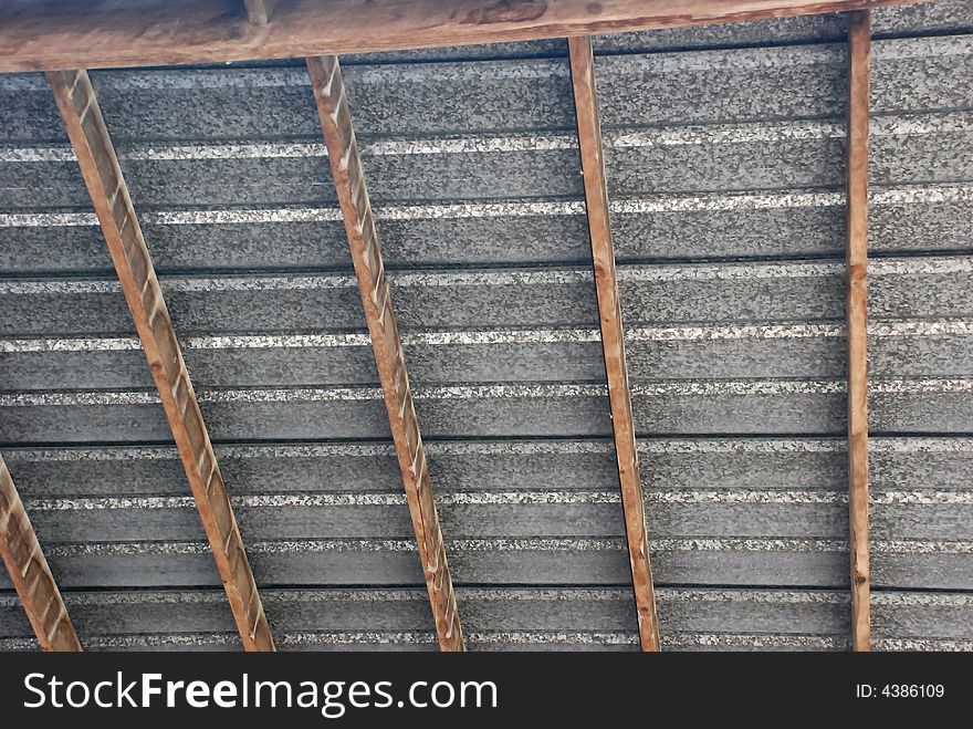 Tin roof texture with wooden slats