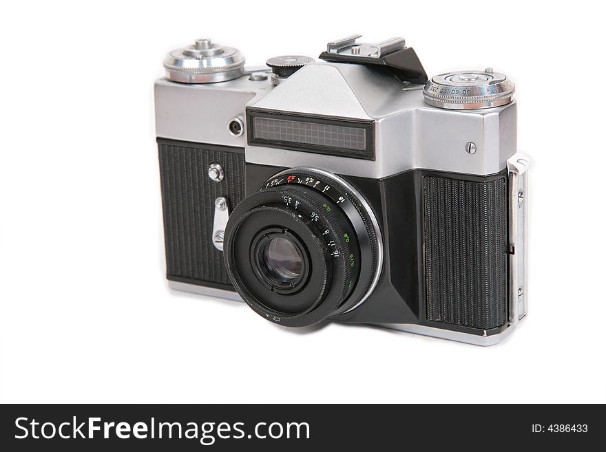 Obsolete photo camera on white