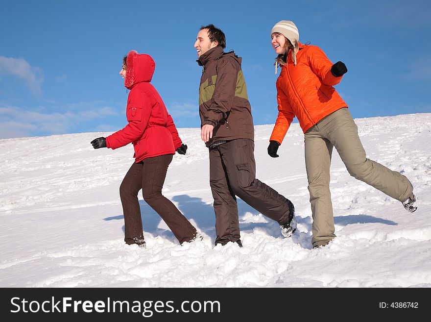 Three Friends Walk On Snow