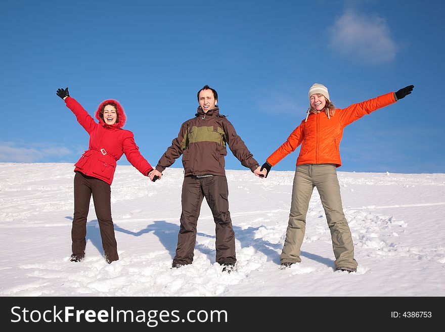 Three Friends Stand On Snow