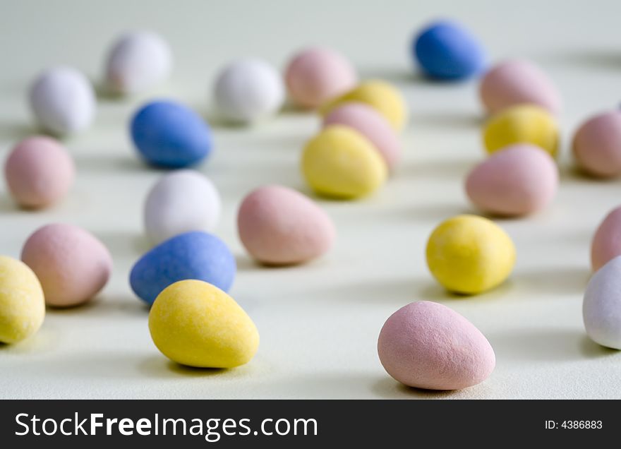 Colorful egg-shaped candies for Easter with selective focus. Colorful egg-shaped candies for Easter with selective focus