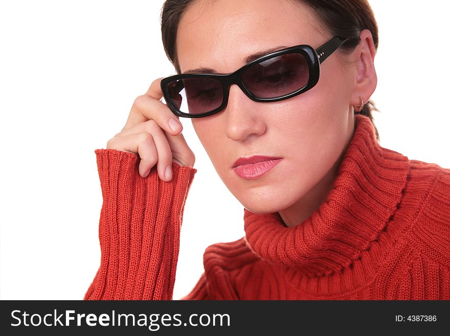 Young woman in dark glasses on white