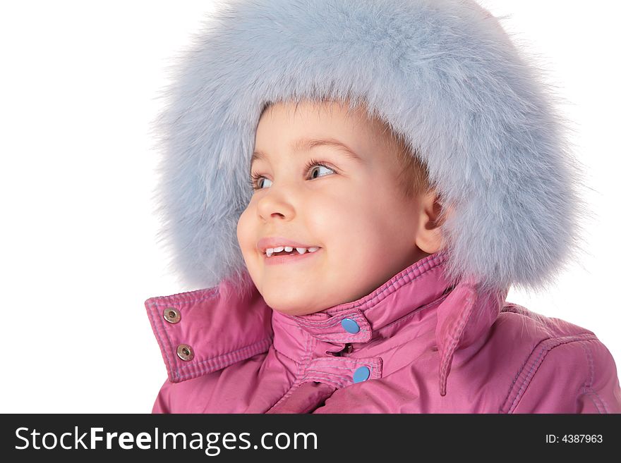 Little girl in furry hat on white
