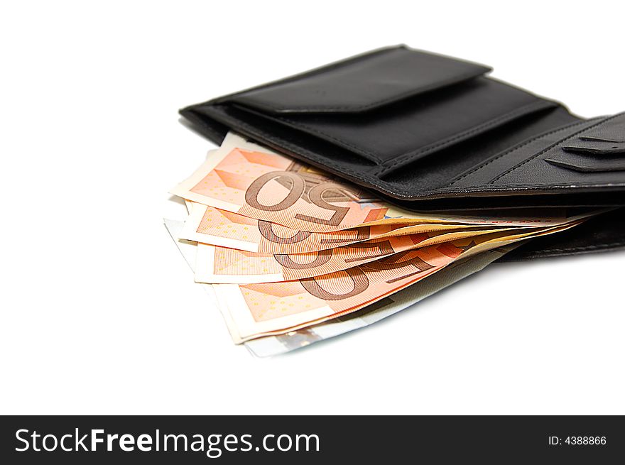 Fifty euro banknotes in leather black purse isolated on white