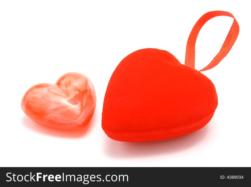 Two loving hearts on white background