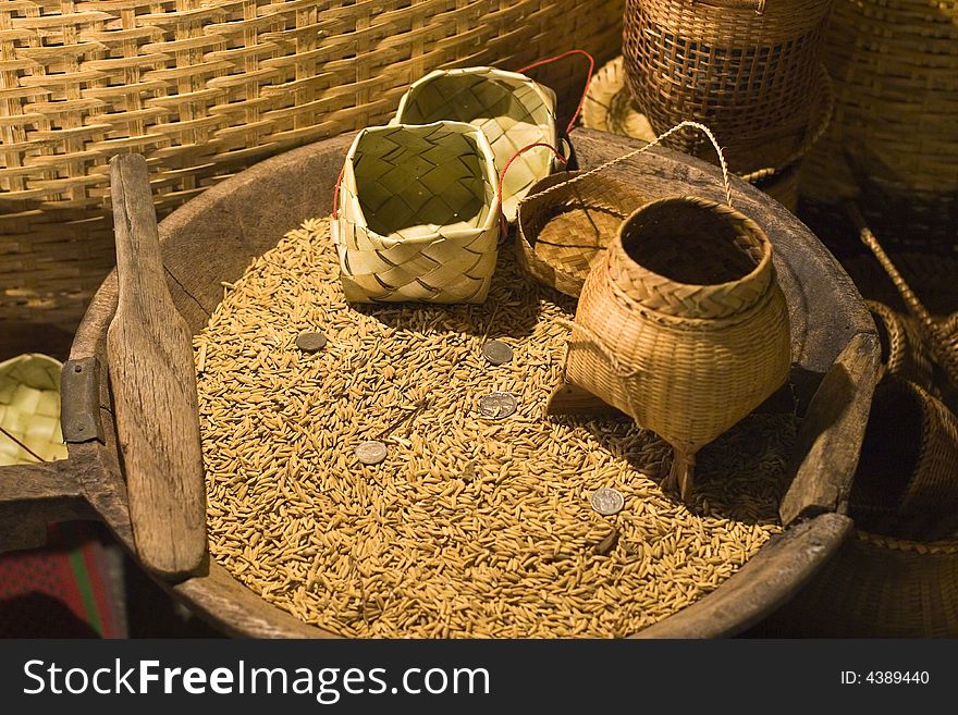 Basket with grain and money in a night market