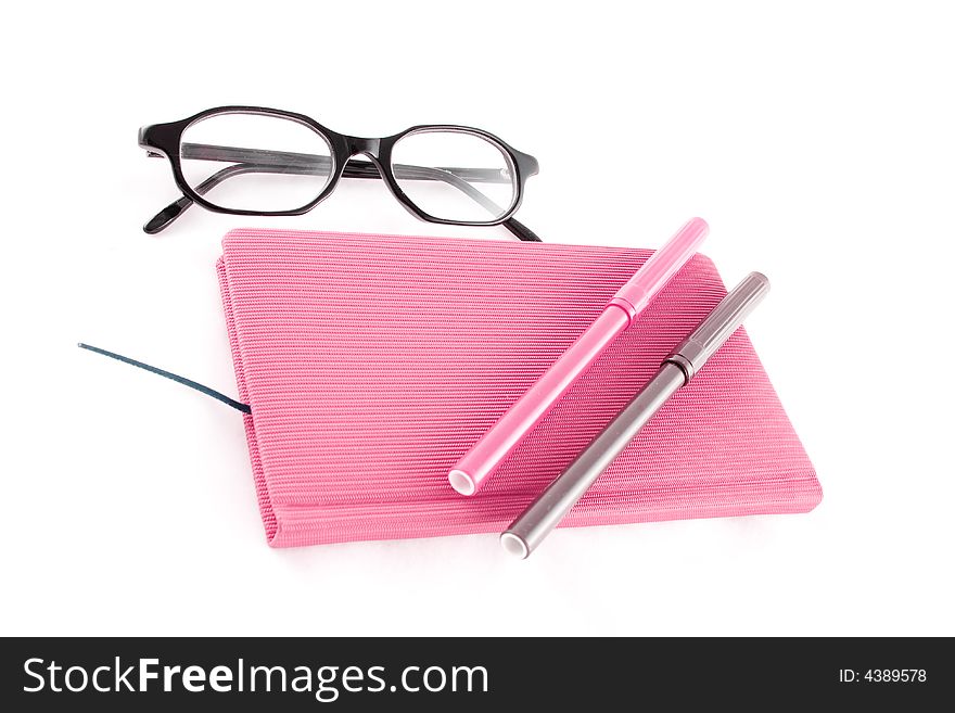 Purple calendar and black glasses isolated on a white background