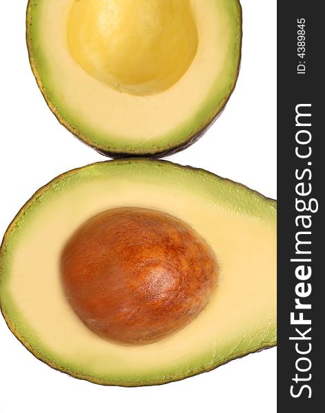 Two slices of a freshly cut avocado. Two slices of a freshly cut avocado