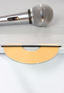 Modern Dvd Player With Microphone And Disk Royalty Free Stock Image