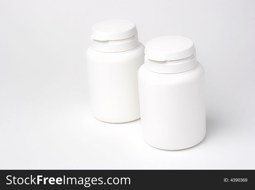 Two white bottle fot pills