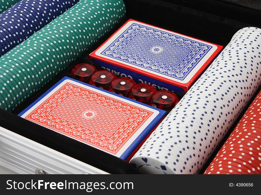 Playing cards dice poker chips all used for gambling. Playing cards dice poker chips all used for gambling