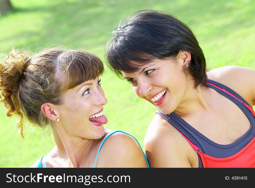 Portrait of two young woman having fun in summer environment. Portrait of two young woman having fun in summer environment