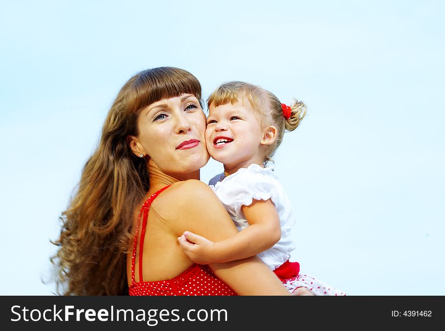 Portrait of young happy mother holding her  baby. Portrait of young happy mother holding her  baby