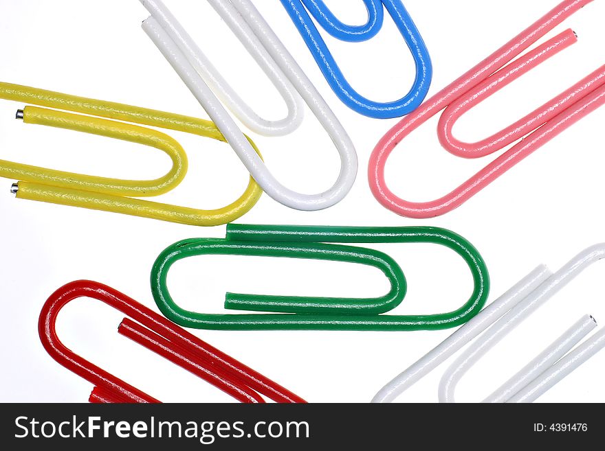 Close-up of colored paperclips isolared on white background. Close-up of colored paperclips isolared on white background