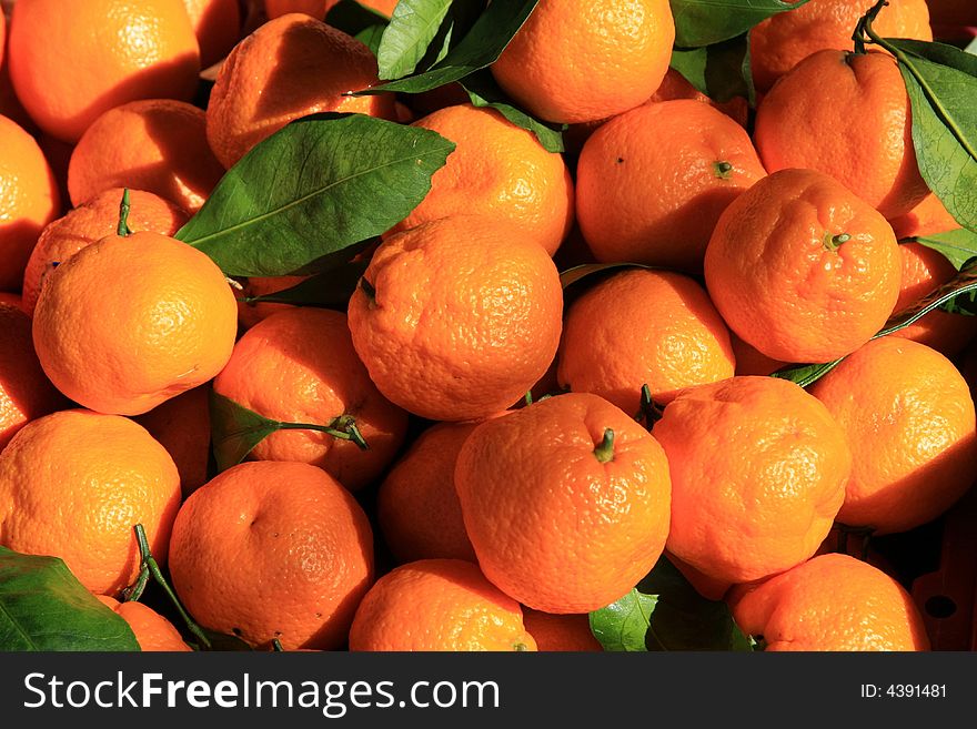 Bushel of oranges at open air market