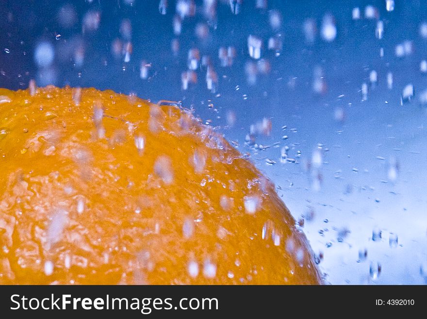 Water Drops bouncing of an Orange. Water Drops bouncing of an Orange