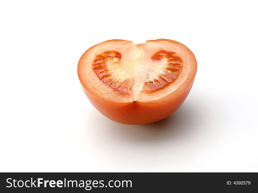 Half Of Tomato On White