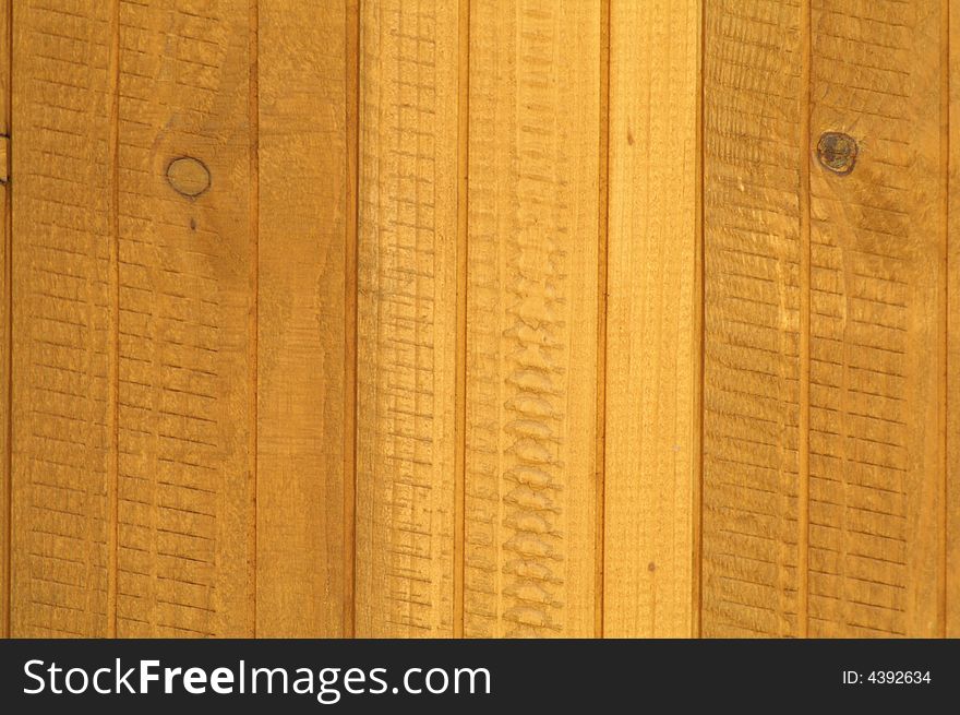 A photo of wooden wall of some suburban house or a shed.