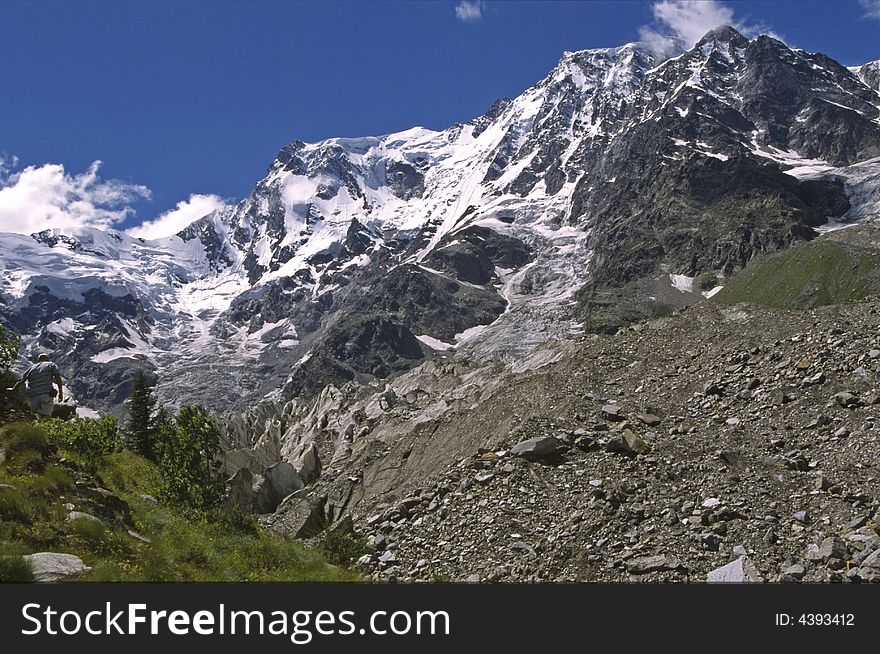 View on gletcher in Italy, snow on mountains and blue sky. View on gletcher in Italy, snow on mountains and blue sky