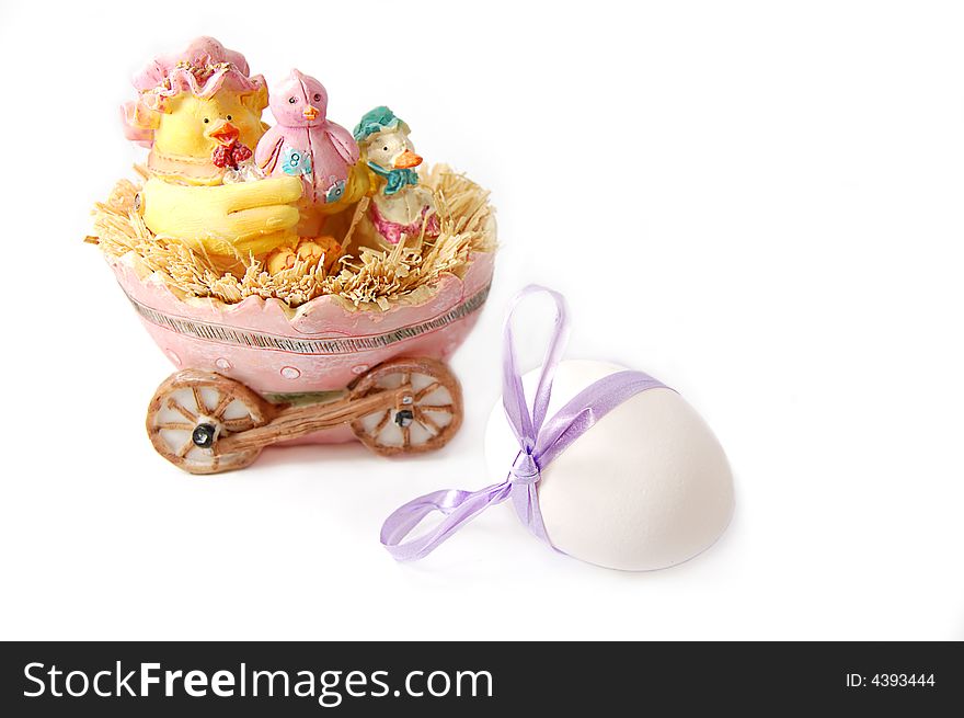 Chicken figurine and egg isolated on white. Chicken figurine and egg isolated on white