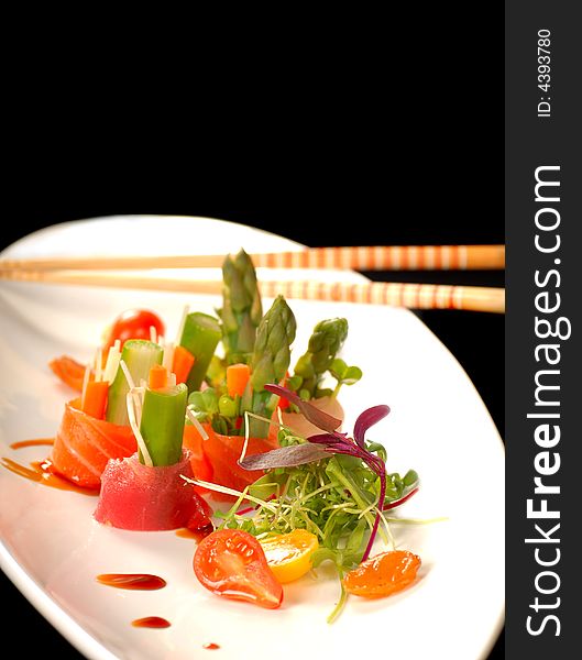 Japanese sashimi on a white plate