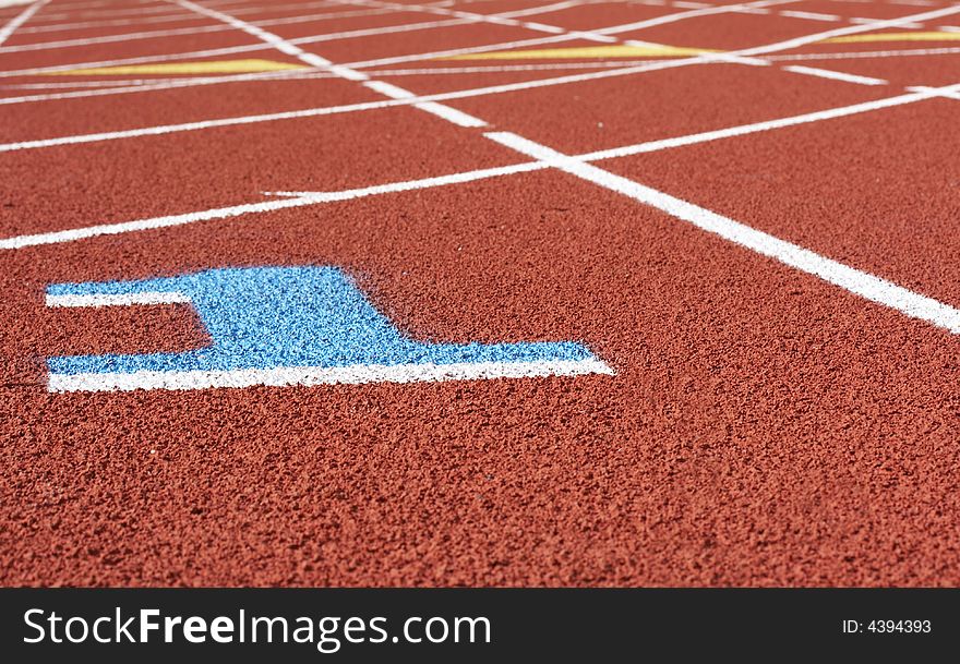 A picture of a track and field venue. A picture of a track and field venue