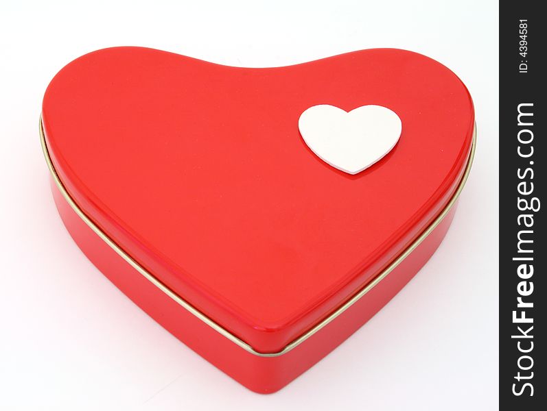 One hearts over a gift box in the shape of a heart