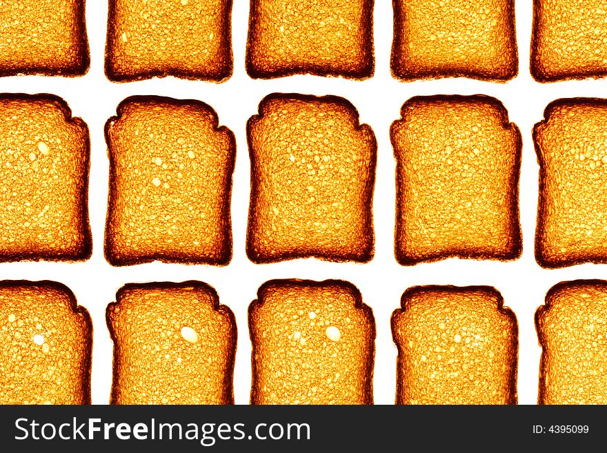 Pattern of golden rusk isolated on white