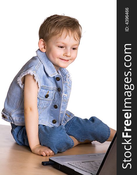 Kid Watching A Movie On A Laptop