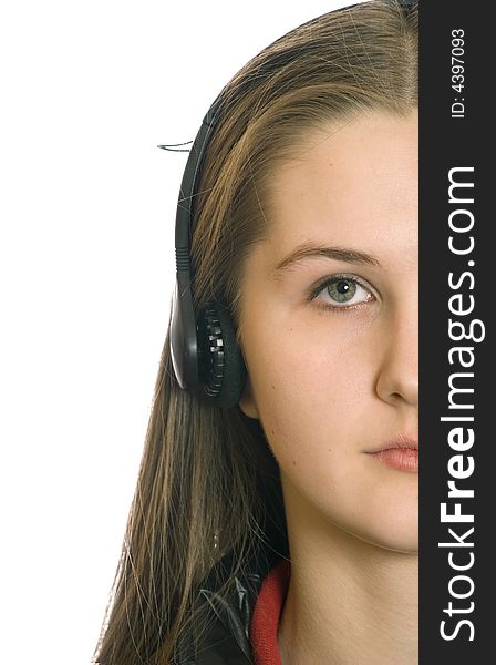 Young  girl in  headphone  on the white background. Young  girl in  headphone  on the white background
