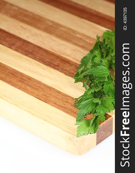 Parsley on the brown plank