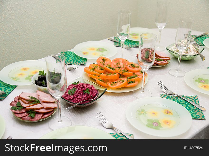 Festive dining table and much tasty meal. Festive dining table and much tasty meal