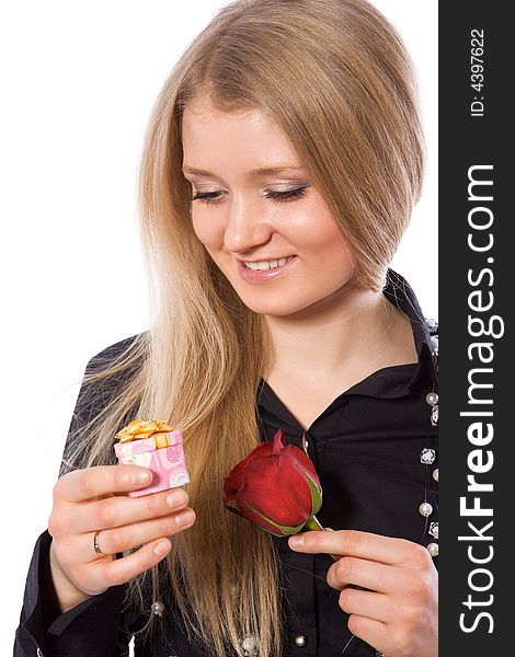 Pretty smiling girl hold red rose and gift isolate on white. Pretty smiling girl hold red rose and gift isolate on white