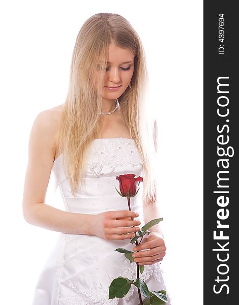 Young sad bride with red rose