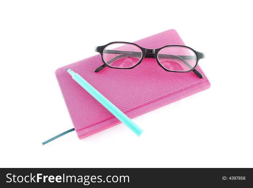 Purple book, black glasses and markers isolated on a white background