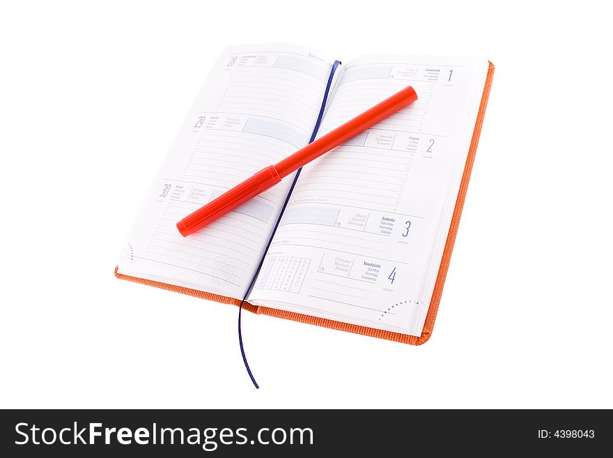 Open red calendar with red marker isolated on a white background. Open red calendar with red marker isolated on a white background