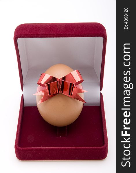 Easter Egg with red bow in Jewelry Box