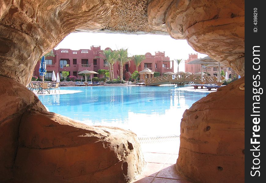 An hole in an artificial mountain in red sea, with a nice view of the resort. An hole in an artificial mountain in red sea, with a nice view of the resort