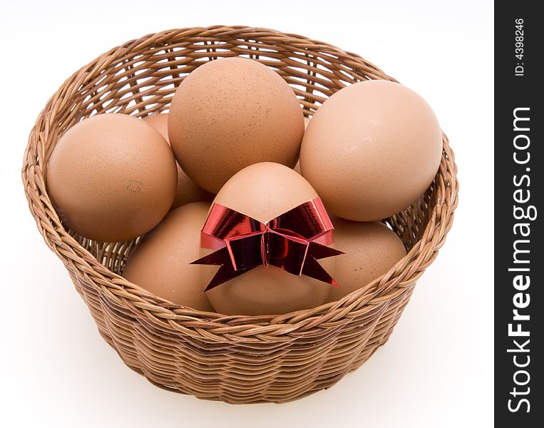 Easter Eggs In Basket on White Background
