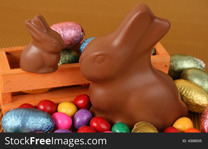 Various colors and shaped easter eggs and bunnies