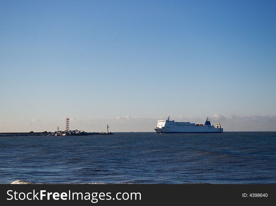 Ferry In The Blue Sea