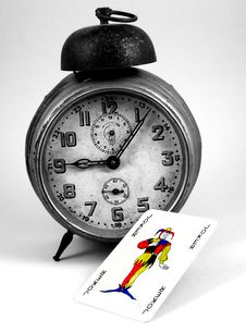 Old Clock And A Joker Card Stock Image Old Clock And A Joker Card Stock Image